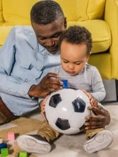 toddler with ball